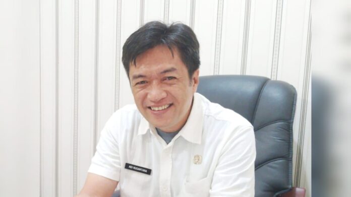 E.S. Adi Nusantara H, S.Sos., M.T.